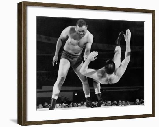 Joe Louis Throws Jim Bernard to the Mat During a 1956 Wrestling Match in Detroit-null-Framed Photo