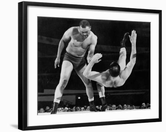 Joe Louis Throws Jim Bernard to the Mat During a 1956 Wrestling Match in Detroit--Framed Photo