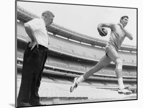 Joe Namath, New York Jets Quarterback, Tests His Injured Knee, 1965-null-Mounted Photo