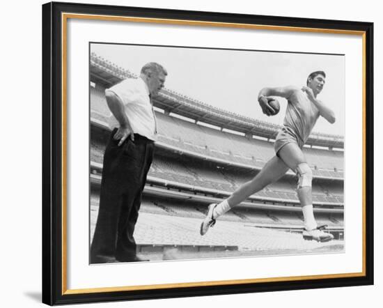 Joe Namath, New York Jets Quarterback, Tests His Injured Knee, 1965-null-Framed Photo