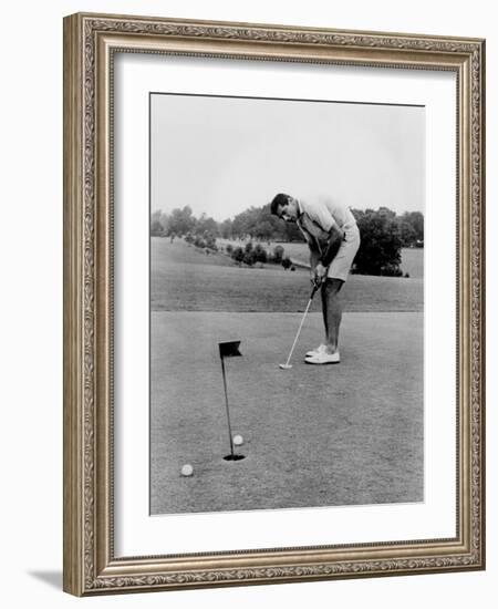 Joe Namath Playing Golf at the University of Alabama in Tuscaloosa, 1966-null-Framed Photo