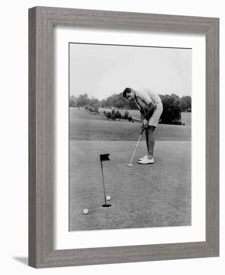 Joe Namath Playing Golf at the University of Alabama in Tuscaloosa, 1966-null-Framed Photo