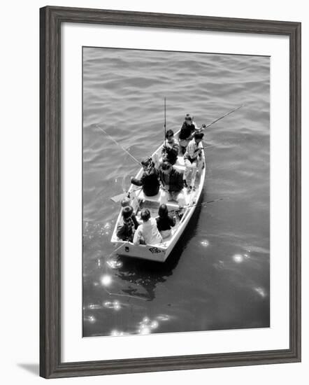 Joe Powers with Eight of His Ten Children Fishing in a Rowboat on Long Island Sound-Yale Joel-Framed Photographic Print