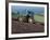 John Deere Tractor with a Rotivator on a Sloping Field in Spring, at Holcombe, Devon, England, UK-Ian Griffiths-Framed Photographic Print