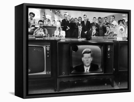 John F. Kennedy's TV Announcement of Cuban Blockade During the Missile Crisis in a Department Store-Ralph Crane-Framed Premier Image Canvas