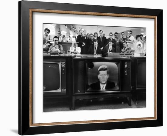 John F. Kennedy's TV Announcement of Cuban Blockade During the Missile Crisis in a Department Store-Ralph Crane-Framed Photographic Print