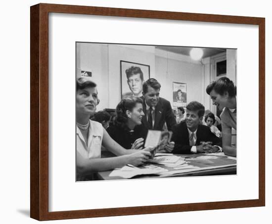 John F. Kennedy with Brother and Sisters Working on His Senate Campaign-Yale Joel-Framed Photographic Print