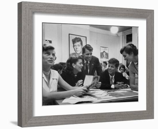 John F. Kennedy with Brother and Sisters Working on His Senate Campaign-Yale Joel-Framed Photographic Print