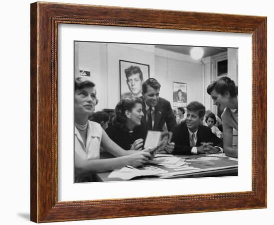 John F. Kennedy with Brother and Sisters Working on His Senate Campaign-Yale Joel-Framed Photographic Print