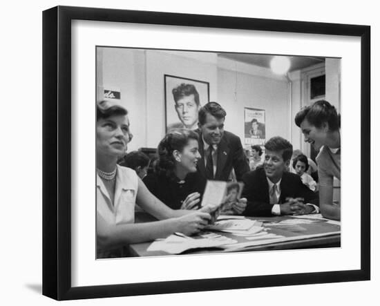 John F. Kennedy with Brother and Sisters Working on His Senate Campaign-Yale Joel-Framed Photographic Print