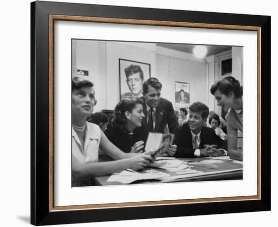 John F. Kennedy with Brother and Sisters Working on His Senate Campaign-Yale Joel-Framed Photographic Print