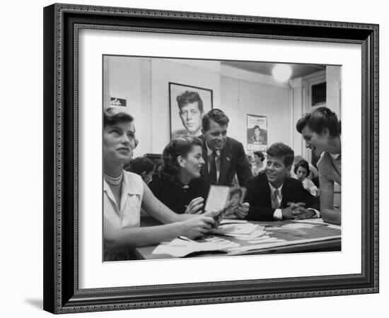 John F. Kennedy with Brother and Sisters Working on His Senate Campaign-Yale Joel-Framed Photographic Print