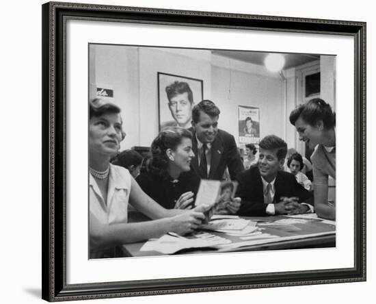 John F. Kennedy with Brother and Sisters Working on His Senate Campaign-Yale Joel-Framed Photographic Print