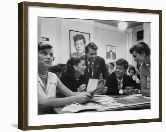 John F. Kennedy with Brother and Sisters Working on His Senate Campaign-Yale Joel-Framed Photographic Print