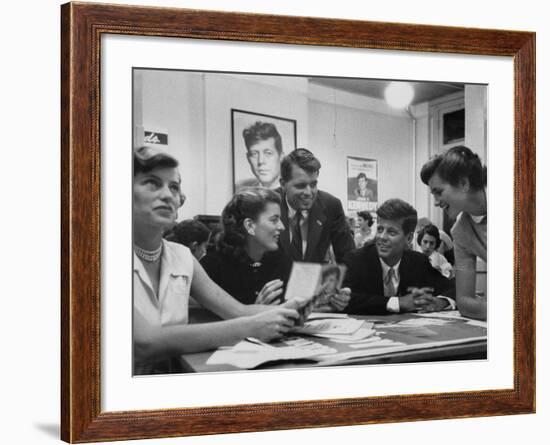 John F. Kennedy with Brother and Sisters Working on His Senate Campaign-Yale Joel-Framed Photographic Print