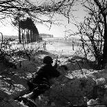 American Soldier Peering Across Snowy Field During Counter Offensive Known as Battle of the Bulge-John Florea-Photographic Print