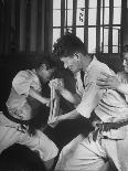 Japanese Karate Student Breaking Boards with Punch-John Florea-Framed Premier Image Canvas