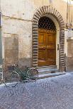 Bicycle parked outside front door, Lucca, Tuscany, Italy, Europe-John Guidi-Photographic Print