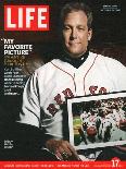 Red Sox Pitcher, Curt Schilling, Holding Photo of 2004 World Series Victory, December 17, 2004-John Huet-Premier Image Canvas