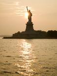 Sun Setting Behind the Statue of Liberty on a Summer Evening-John Nordell-Framed Photographic Print