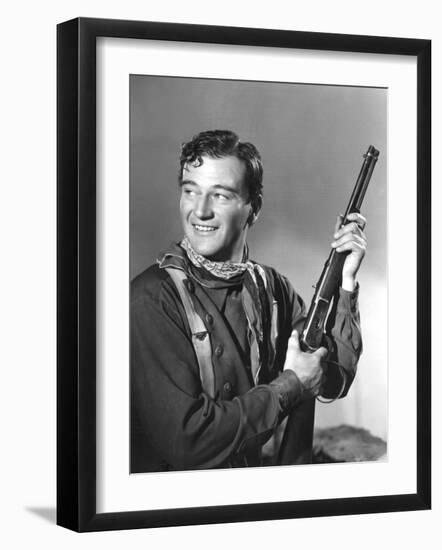 John Wayne in Costume for Stagecoach, 1939-null-Framed Photo