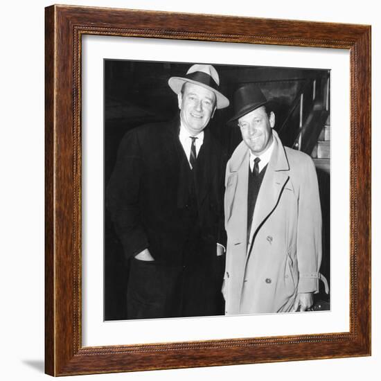 John Wayne, William Holden in New York City, 1960-null-Framed Photo