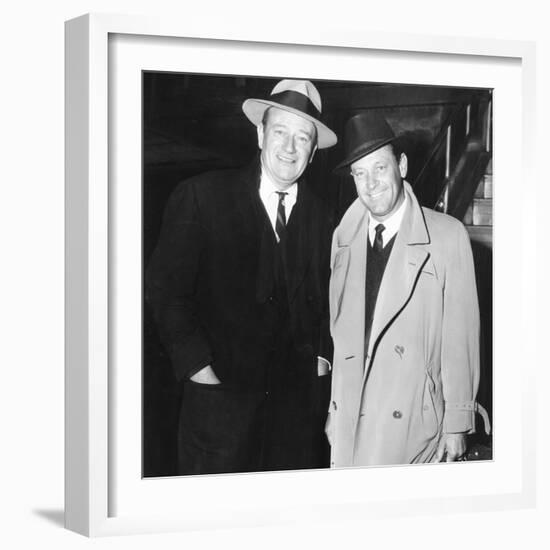 John Wayne, William Holden in New York City, 1960-null-Framed Photo