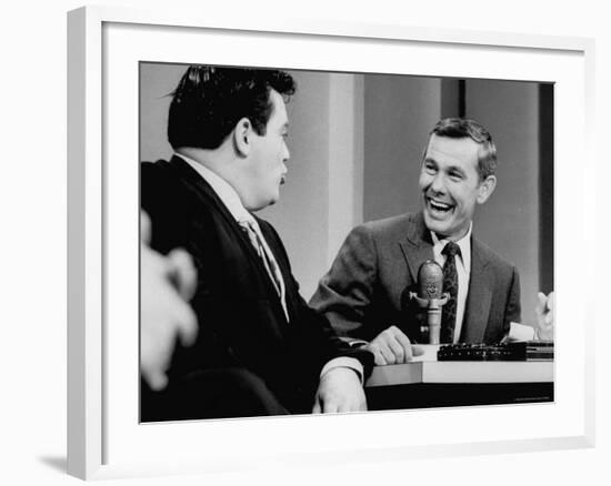 Johnny Carson and Jimmy Breslin Enjoying Conversation During Taping of the Johnny Carson Show-Arthur Schatz-Framed Premium Photographic Print