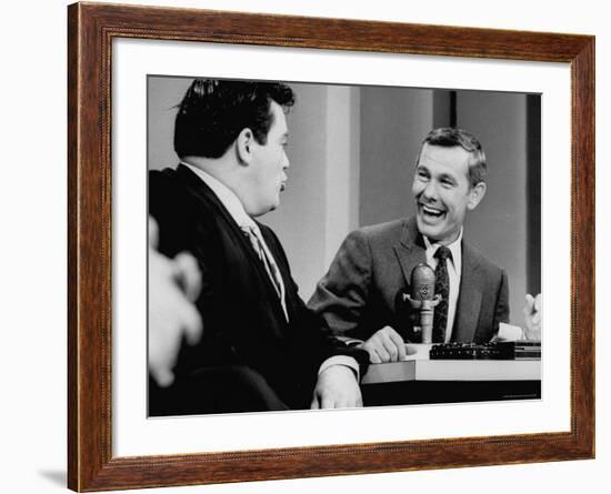 Johnny Carson and Jimmy Breslin Enjoying Conversation During Taping of the Johnny Carson Show-Arthur Schatz-Framed Premium Photographic Print