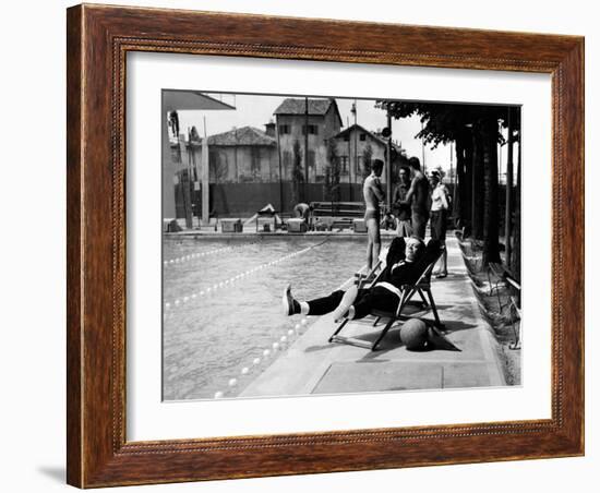 Johnny Dorelli at the Edge of a Swimming Pool-Angelo Cozzi-Framed Photographic Print