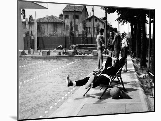 Johnny Dorelli at the Edge of a Swimming Pool-Angelo Cozzi-Mounted Photographic Print