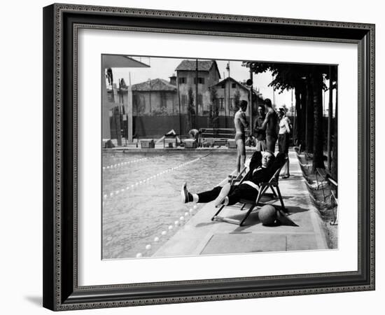 Johnny Dorelli at the Edge of a Swimming Pool-Angelo Cozzi-Framed Photographic Print