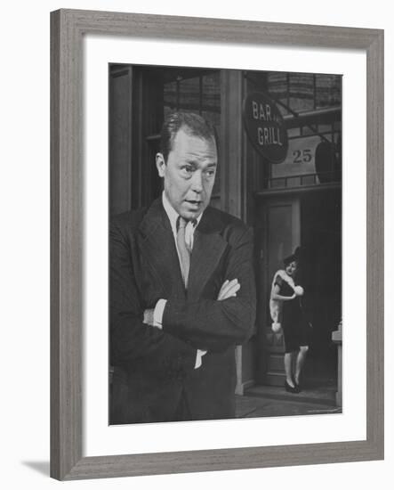 Johnny Mercer Singing a Song in Front of the Bar and Grill-Peter Stackpole-Framed Premium Photographic Print