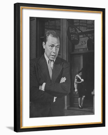 Johnny Mercer Singing a Song in Front of the Bar and Grill-Peter Stackpole-Framed Premium Photographic Print