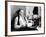 Journalist Sitting on His Bed with a Typewriter, Typing-null-Framed Photo