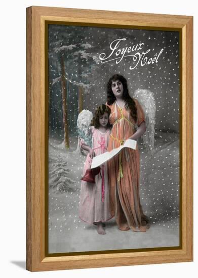 Joyeux Noel - Merry Christmas in French, Little Girl Carols with Angel-Lantern Press-Framed Stretched Canvas