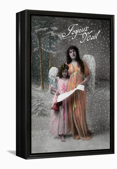 Joyeux Noel - Merry Christmas in French, Little Girl Carols with Angel-Lantern Press-Framed Stretched Canvas