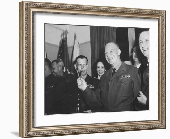 Jubilant Gen. Dwight Eisenhower Holding Pens in V for Victory-Ralph Morse-Framed Photographic Print