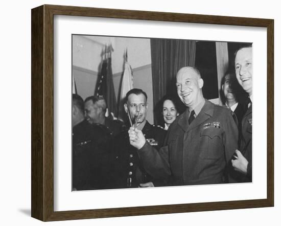 Jubilant Gen. Dwight Eisenhower Holding Pens in V for Victory-Ralph Morse-Framed Photographic Print