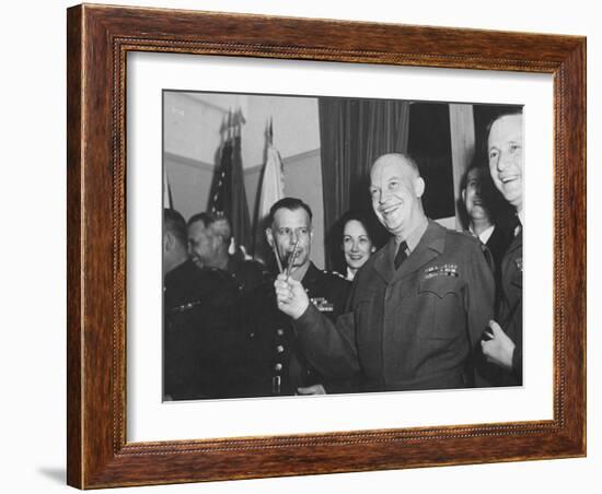 Jubilant Gen. Dwight Eisenhower Holding Pens in V for Victory-Ralph Morse-Framed Photographic Print