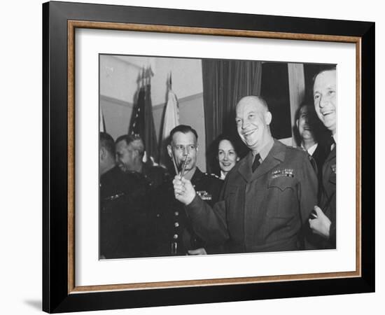 Jubilant Gen. Dwight Eisenhower Holding Pens in V for Victory-Ralph Morse-Framed Photographic Print