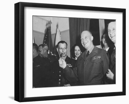 Jubilant Gen. Dwight Eisenhower Holding Pens in V for Victory-Ralph Morse-Framed Photographic Print