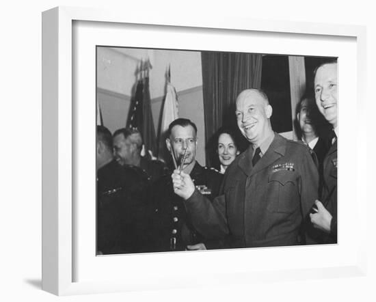 Jubilant Gen. Dwight Eisenhower Holding Pens in V for Victory-Ralph Morse-Framed Photographic Print