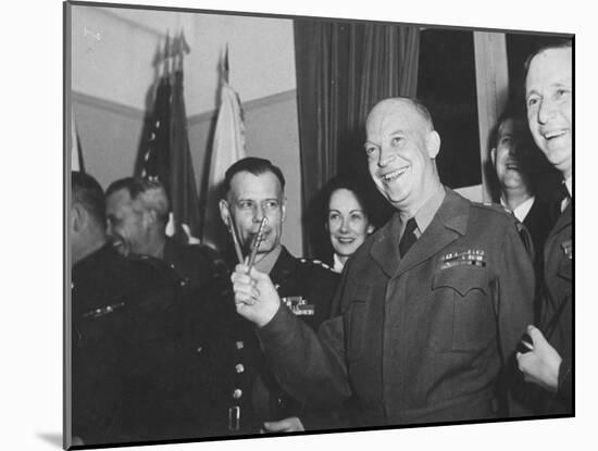Jubilant Gen. Dwight Eisenhower Holding Pens in V for Victory-Ralph Morse-Mounted Photographic Print