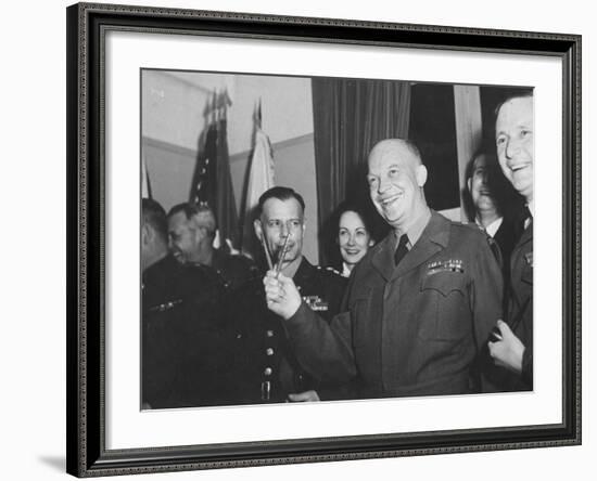 Jubilant Gen. Dwight Eisenhower Holding Pens in V for Victory-Ralph Morse-Framed Photographic Print