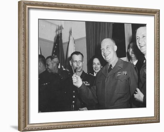 Jubilant Gen. Dwight Eisenhower Holding Pens in V for Victory-Ralph Morse-Framed Photographic Print