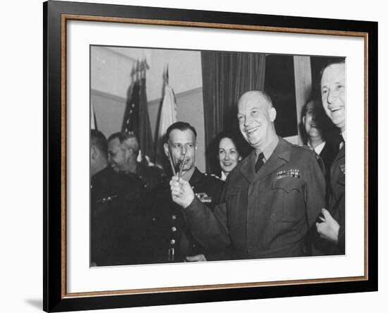 Jubilant Gen. Dwight Eisenhower Holding Pens in V for Victory-Ralph Morse-Framed Photographic Print