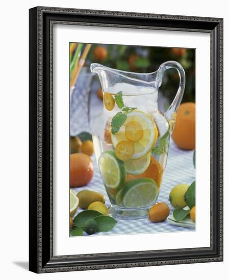Jug of Water with Citrus Fruit, Lemon Balm and Ice Cubes-F. Strauss-Framed Photographic Print