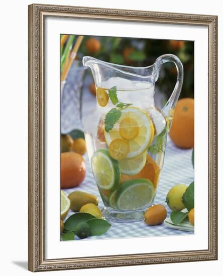 Jug of Water with Citrus Fruit, Lemon Balm and Ice Cubes-F. Strauss-Framed Photographic Print