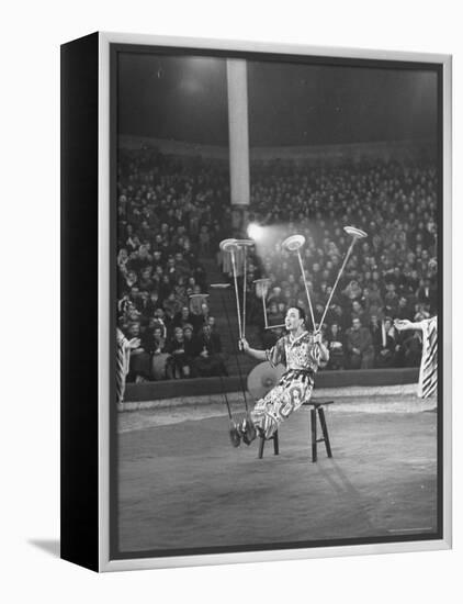 Juggler Spinning Seven Plates at Once-Thomas D^ Mcavoy-Framed Premier Image Canvas